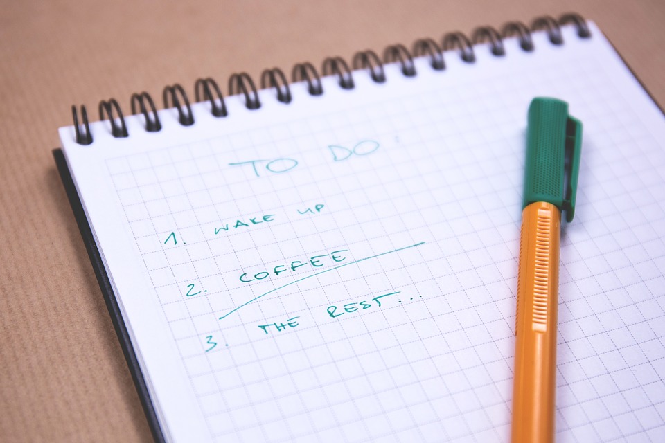 my crossroads center shopping to-do list notepad wake up coffe rest pen green on graph paper